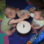 Playing bongo drums with cousin Jojo