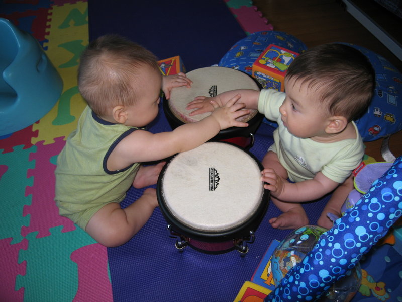 Playing bongo drums with cousin Jojo